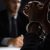Criminal man with handcuffs in interrogation room feeling guilty after committed a crime